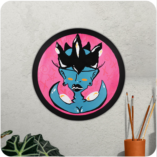 The Casual Covert Original Crown My Clit (2023) hanging on a wall.