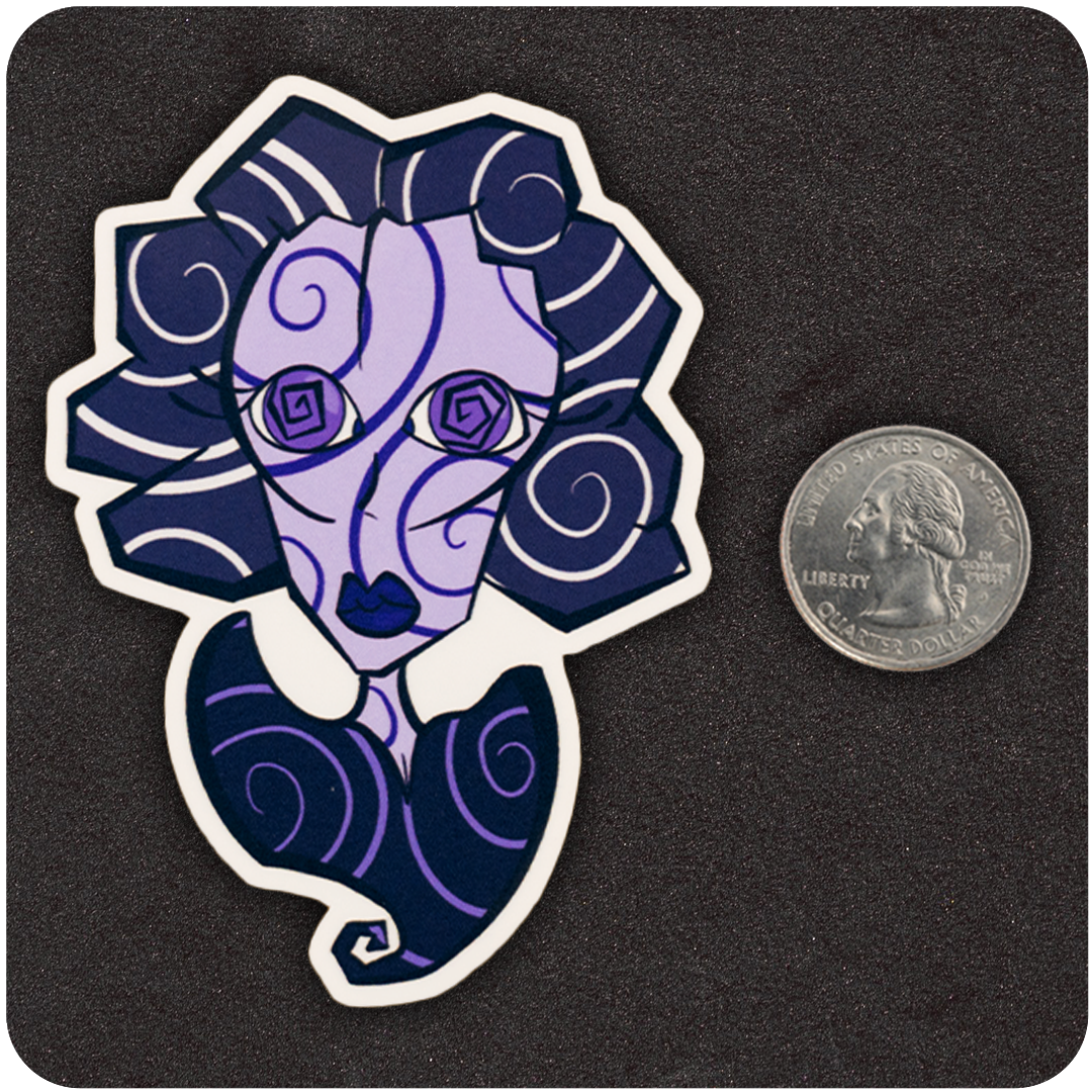 A vinyl sticker of a stylized purple and navy-blue bust with hypnotic spiral eyes and swirling hair patterns. The figure’s face is elongated and abstract, with blue lips and geometric curves. A U.S. quarter is placed beside the sticker to show scale, on a textured black background.