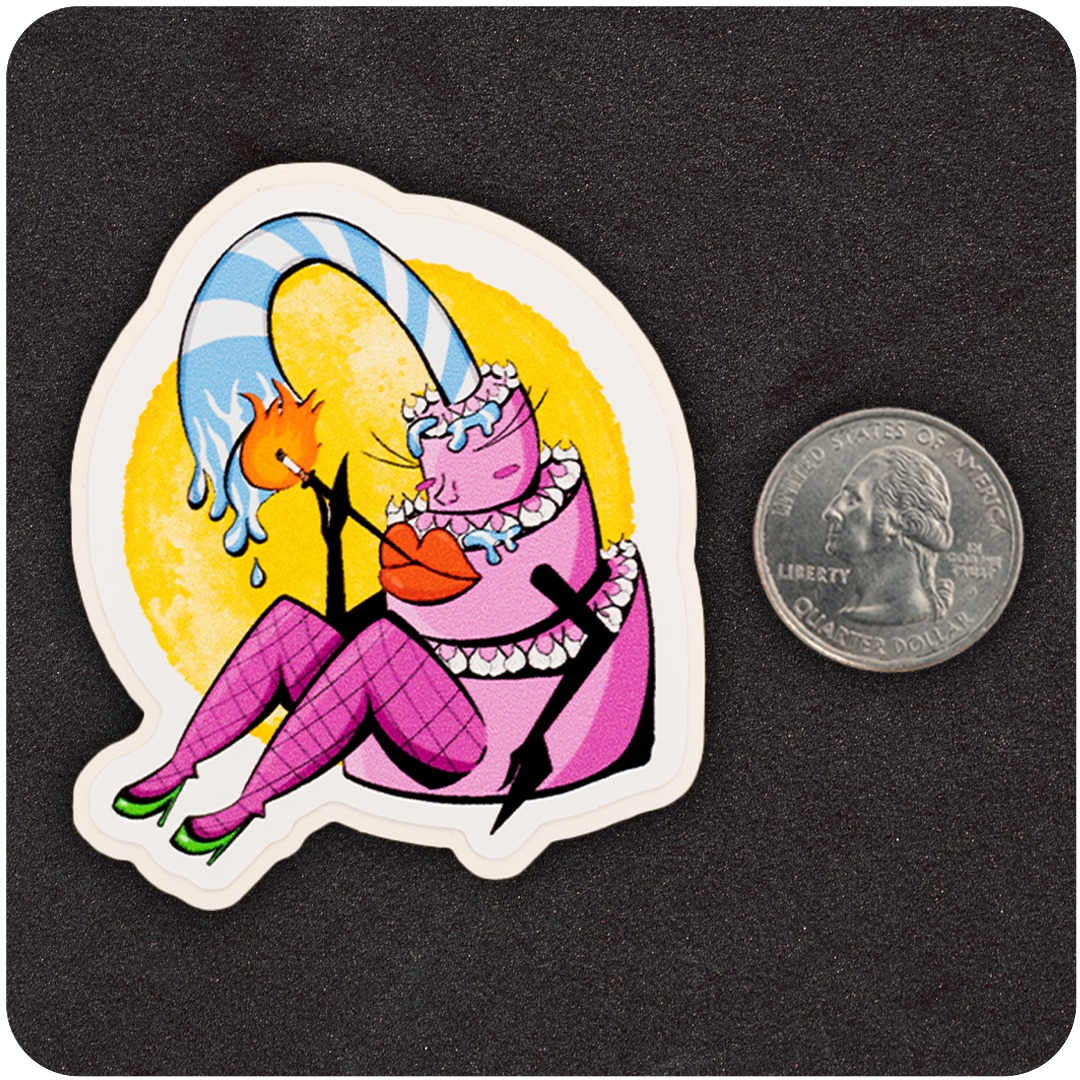 A colorful vinyl sticker featuring a cheeky anthropomorphic birthday cake character. The cake is pink with frosting layers, large red lips, and fishnet-clad legs in green heels. A tall, striped candle arches over the character, dripping wax toward a lit matchstick. The sticker is set against a textured black background with a bright yellow circle behind the character. A U.S. quarter is placed next to the sticker for scale.