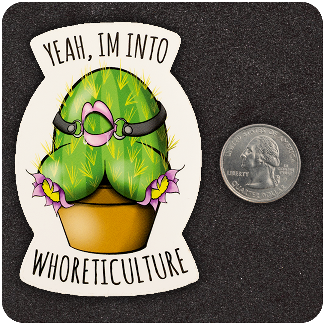 A humorous vinyl sticker featuring a green cactus shaped like a bottom, with spines, flowers, and a pink bondage harness. The cactus sits in a brown flower pot. Text above and below the image reads, “Yeah, I’m into WHORETICULTURE.” A U.S. quarter is placed beside the sticker to show scale. The background is a dark, textured surface.
