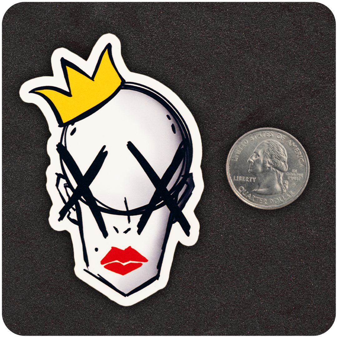 The Casual Covert Crown Bitch vinyl sticker next to a quarter for scale. 