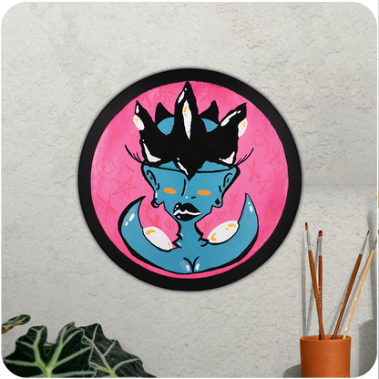 The Casual Covert Original Crown My Clit (2023) hanging on a wall. 