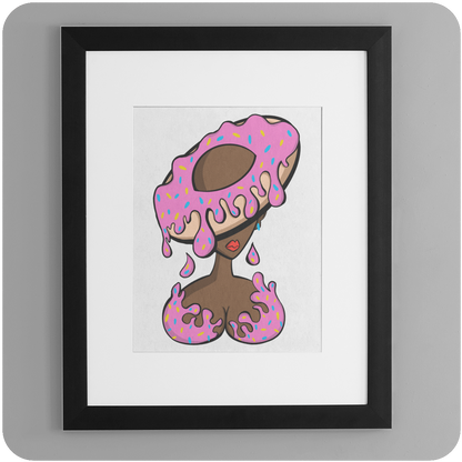 Framed art print of a stylized woman with a large pink frosted doughnut as a hat, dripping with icing and colorful sprinkles. The woman has brown skin and red lips, with matching doughnut frosting design over the chest. Displayed in a black frame with white matting against a light gray wall.