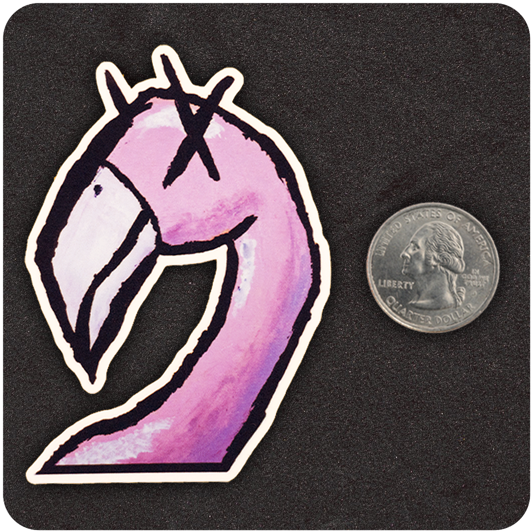 The Casual Covert Flamingo Vinyl Sticker next to a quarter to show its scale and size.