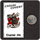 The Casual Covert Murder My Pussy Enamel Pin next to a quarter to show it's scale. 