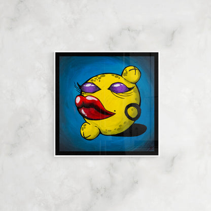 Colorful original painting titled “Pussy Pop Lemon Drop” featuring a stylized yellow lemon character with exaggerated red lips, purple eyeshadow, and hoop earring, displayed against a vibrant blue background on a white marble wall.